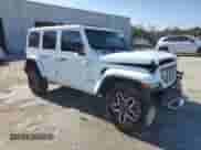 2024 Jeep Wrangler Sahara с VIN 1C4PJXEG8RW268279, выставлен на аукционе Copart как лот 84605894 с пробегом 6 580 миль миль и Списание • Salvage title. История ставок и продаж доступна на DreamBid. Изображение 4.