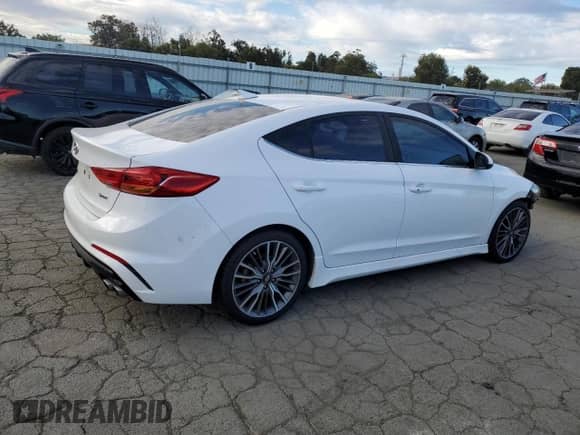 2018 Hyundai Elantra Sport с VIN KMHD04LB3JU451628, выставлен на аукционе Copart как лот 82335675 с пробегом 94 662 миль миль и Списание • Salvage title. История ставок и продаж доступна на DreamBid. Изображение 3.