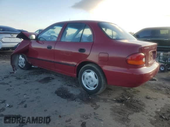 1997 Hyundai Accent GL z VIN KMHVF24N9VU356190, wystawiony jako Copart lot #85610774 z przebiegiem 91 707 mil mil oraz Czysty tytuł • Clean title. Historia ofert i sprzedaży dostępna na DreamBid. Obrazek 2.