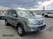 2009 Honda Pilot Touring with VIN 5FNYF48829B014693, listed as a Copart auction lot 65152355 with 160,961 mi miles and Salvage title. Bid and sale history available at DreamBid. Image 14.