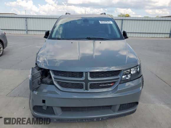2020 Dodge Journey SE Value with VIN 3C4PDCAB0LT264587, listed as a Copart auction lot 82344675 with 124,060 mi miles and Salvage title. Bid and sale history available at DreamBid. Image 5.