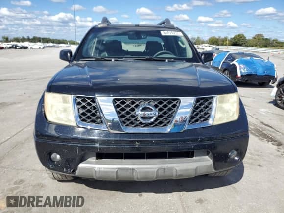 2006 Nissan Frontier SE with VIN 1N6AD07UX6C412495, listed as a Copart auction lot 84879235 with 257,704 mi miles and Salvage title. Bid and sale history available at DreamBid. Image 5.