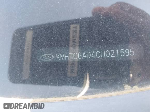 2012 Hyundai Veloster w/Black Int с VIN KMHTC6AD4CU021595, выставлен на аукционе IAAI как лот 42004371 с пробегом 149 637 миль миль и . История ставок и продаж доступна на DreamBid. Изображение 9.