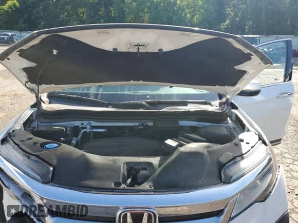 2021 Honda Pilot Touring 8-Passenger z VIN 5FNYF5H94MB042955, wystawiony jako Copart lot #62386735 z przebiegiem 58 976 mil mil oraz Szkoda całkowita • Salvage title. Historia ofert i sprzedaży dostępna na DreamBid. Obrazek 12.