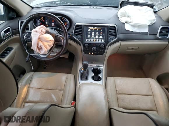 2018 Jeep Grand Cherokee Overland with VIN 1C4RJFCT7JC435403, listed as a Copart auction lot 86568024 with 105,681 mi miles and Salvage title. Bid and sale history available at DreamBid. Image 8.