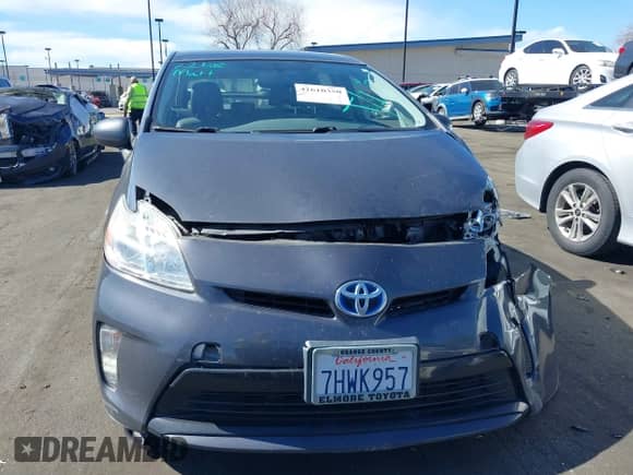 2015 Toyota Prius Four with VIN JTDKN3DU9F1890512, listed as a IAAI auction lot 41610350 with 86,396 mi miles and . Bid and sale history available at DreamBid. Image 13.