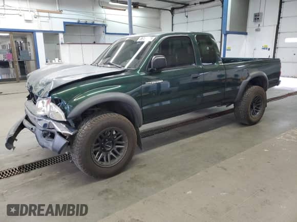 2003 Toyota Tacoma PreRunner with VIN 5TESM92N43Z251344, listed as a Copart auction lot 86184425 with 194,763 mi miles and Salvage title. Bid and sale history available at DreamBid. Image 1.