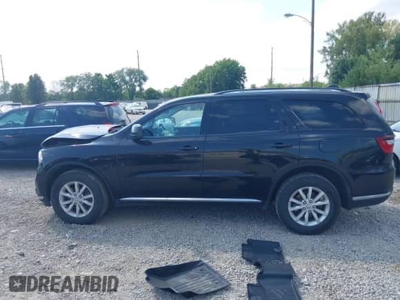 2015 Dodge Durango SXT with VIN 1C4RDJAG9FC938535, listed as a IAAI auction lot 43006107 with 74,658 mi miles and . Bid and sale history available at DreamBid. Image 14.