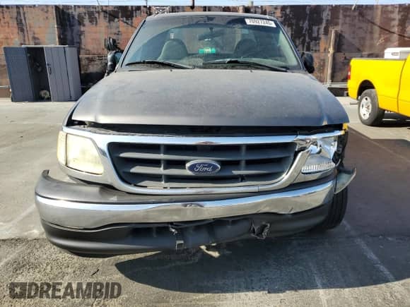 2003 Ford F-150 XL with VIN 1FTRX17223KB15935, listed as a Copart auction lot 70927245 with 167,265 mi miles and Salvage title. Bid and sale history available at DreamBid. Image 5.