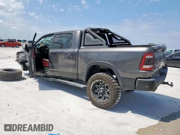 2020 Ram 1500 Rebel z VIN 1C6SRFLT2LN199221, wystawiony jako Copart lot #68965755 z przebiegiem 49 714 mil mil oraz Szkoda całkowita • Salvage title. Historia ofert i sprzedaży dostępna na DreamBid. Obrazek 2.