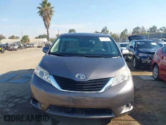 2011 Toyota Sienna LE with VIN 5TDKK3DC5BS125486, listed as a IAAI auction lot 42934003 with 104,158 mi miles and . Bid and sale history available at DreamBid. Image 12.