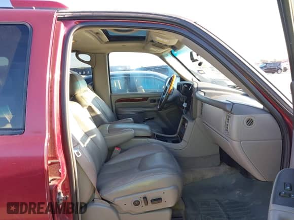 2003 Cadillac Escalade z VIN 1GYEK63N93R133151, wystawiony jako IAAI lot #42552106 z przebiegiem 227 410 mil mil oraz . Historia ofert i sprzedaży dostępna na DreamBid. Obrazek 5.