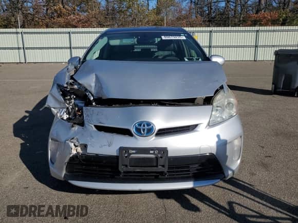 2015 Toyota Prius Four z VIN JTDKN3DUXF1894861, wystawiony jako Copart lot #89679235 z przebiegiem Nie podano mil oraz Szkoda całkowita • Salvage title. Historia ofert i sprzedaży dostępna na DreamBid. Obrazek 5.