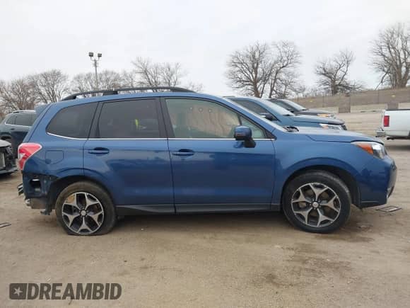2014 Subaru Forester XT Touring z VIN JF2SJGMC9EH428341, wystawiony jako IAAI lot #41185804 z przebiegiem 111 000 mil mil oraz . Historia ofert i sprzedaży dostępna na DreamBid. Obrazek 13.