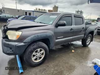 2012 Toyota Tacoma PreRunner with VIN 5TFJU4GN0CX014302, listed as a Copart auction lot 82157225 with 193,416 mi miles and Salvage title. Bid and sale history available at DreamBid. Image 1.