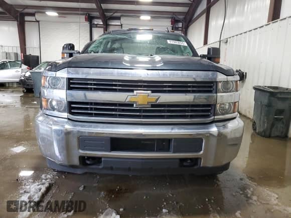 2017 Chevrolet Silverado 2500HD Work Truck with VIN 1GC1KUEG9HF134056, listed as a Copart auction lot 41985655 with 119,199 mi miles and Salvage title. Bid and sale history available at DreamBid. Image 5.