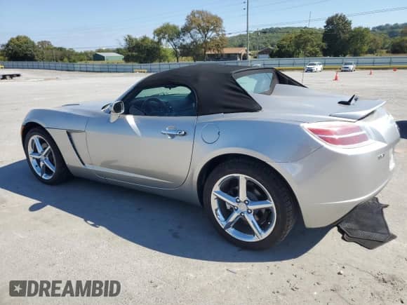 2007 Saturn Sky с VIN 1G8MB35B57Y116288, выставлен на аукционе Copart как лот 84903585 с пробегом 99 777 миль миль и Списание • Salvage title. История ставок и продаж доступна на DreamBid. Изображение 2.