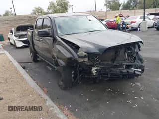 2022 Toyota Tacoma SR with VIN 3TYAX5GN0NT043082, listed as a IAAI auction lot 42783716 with 64,648 mi miles and . Bid and sale history available at DreamBid. Image 1.
