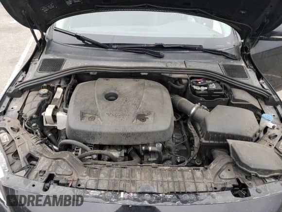 2018 Volvo S60 Inscription с VIN LYV402HK8JB166323, выставлен на аукционе Copart как лот 76267414 с пробегом 145 427 миль миль и Списание • Salvage title. История ставок и продаж доступна на DreamBid. Изображение 12.