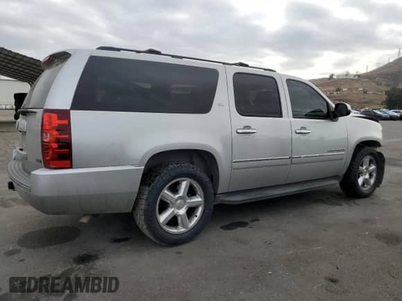 2010 Chevrolet Suburban LTZ с VIN 1GNUCKE07AR197122, выставлен на аукционе Copart как лот 86930304 с пробегом 211 671 миль миль и Списание • Salvage title. История ставок и продаж доступна на DreamBid. Изображение 3.