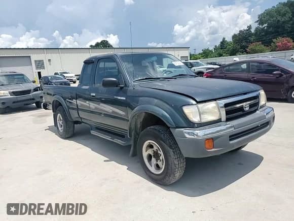 1998 Toyota Tacoma z VIN 4TASM92N7WZ121828, wystawiony jako Copart lot #64122235 z przebiegiem 200 637 mil mil oraz Szkoda całkowita • Salvage title. Historia ofert i sprzedaży dostępna na DreamBid. Obrazek 13.