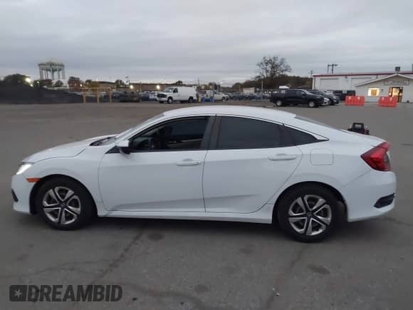 2016 Honda Civic LX z VIN 2HGFC2F55GH512280, wystawiony jako IAAI lot #43563898 z przebiegiem 94 594 mil mil oraz . Historia ofert i sprzedaży dostępna na DreamBid. Obrazek 14.