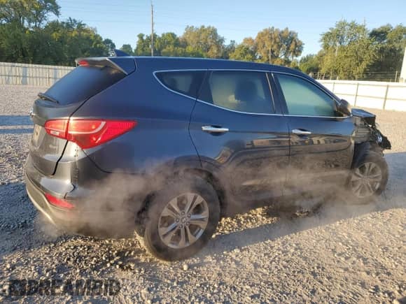 2014 Hyundai Santa Fe with VIN 5XYZT3LB2EG161853, listed as a Copart auction lot 70506955 with 144,512 mi miles and Salvage title. Bid and sale history available at DreamBid. Image 3.