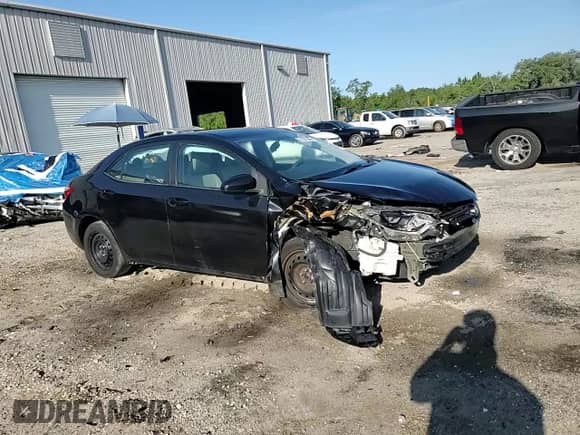 2016 Toyota Corolla L z VIN 5YFBURHE2GP560748, wystawiony jako Copart lot #61627505 z przebiegiem 216 887 mil mil oraz Szkoda całkowita • Salvage title. Historia ofert i sprzedaży dostępna na DreamBid. Obrazek 14.