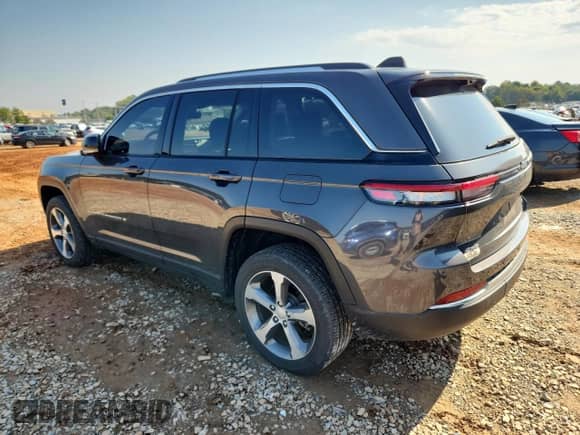 2023 Jeep Grand Cherokee Limited with VIN 1C4RJHBGXPC511494, listed as a Copart auction lot 71272825 with 15,121 mi miles and Salvage title. Bid and sale history available at DreamBid. Image 2.