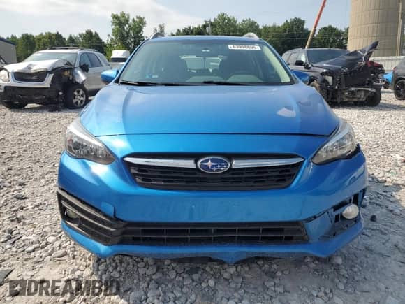 2021 Subaru Impreza Premium with VIN 4S3GTAD60M3702088, listed as a Copart auction lot 63990895 with 67,757 mi miles and Salvage title. Bid and sale history available at DreamBid. Image 5.