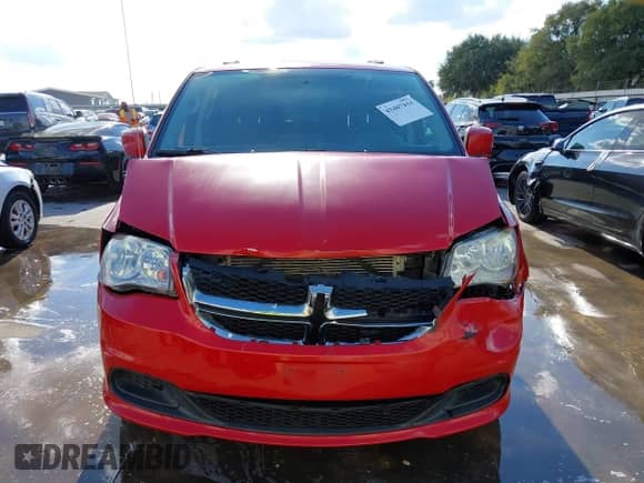 2015 Dodge Grand Caravan SXT with VIN 2C4RDGCG4FR585175, listed as a IAAI auction lot 43407444 with 104,404 mi miles and . Bid and sale history available at DreamBid. Image 13.
