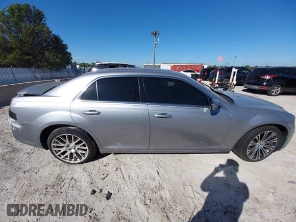 2014 Chrysler 300 S with VIN 2C3CCABT5EH118814, listed as a IAAI auction lot 43351388 with 152,597 mi miles and . Bid and sale history available at DreamBid. Image 13.