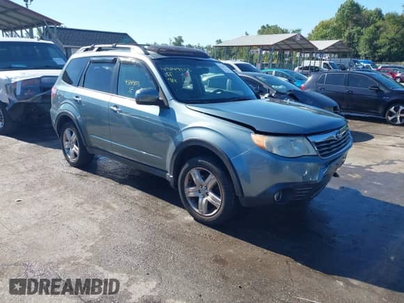 2009 Subaru Forester X Limited z VIN JF2SH64669H797065, wystawiony jako IAAI lot #43149123 z przebiegiem 146 639 mil mil oraz . Historia ofert i sprzedaży dostępna na DreamBid. Obrazek 1.