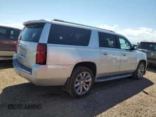 2015 Chevrolet Suburban LTZ with VIN 1GNSKKKC8FR175386, listed as a Copart auction lot 69584055 with 178,879 mi miles and Salvage title. Bid and sale history available at DreamBid. Image 3.