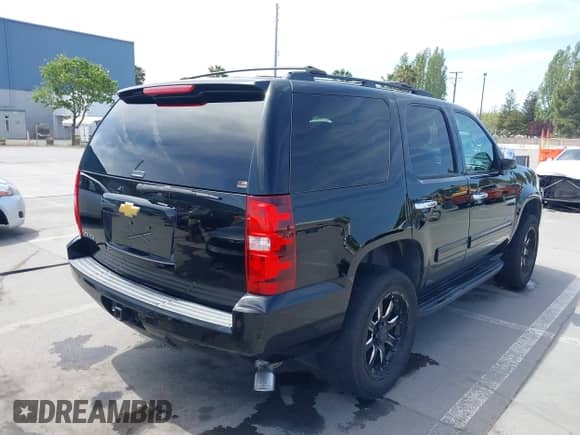 2013 Chevrolet Tahoe LS with VIN 1GNSKAE07DR355208, listed as a IAAI auction lot 42095090 with 159,409 mi miles and . Bid and sale history available at DreamBid. Image 6.