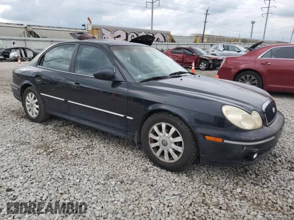 2002 Hyundai Sonata GLS with VIN KMHWF35H52A615774, listed as a Copart auction lot 72336474 with 156,588 mi miles and Salvage title. Bid and sale history available at DreamBid. Image 4.