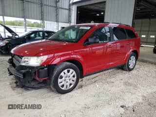 2017 Dodge Journey SE with VIN 3C4PDCAB2HT581889, listed as a Copart auction lot 84604785 with 111,807 mi miles and Salvage title. Bid and sale history available at DreamBid. Image 1.