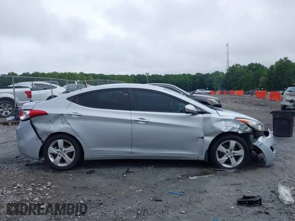 2012 Hyundai Elantra Limited z VIN 5NPDH4AE1CH147141, wystawiony jako IAAI lot #42965318 z przebiegiem 169 274 mil mil oraz . Historia ofert i sprzedaży dostępna na DreamBid. Obrazek 13.