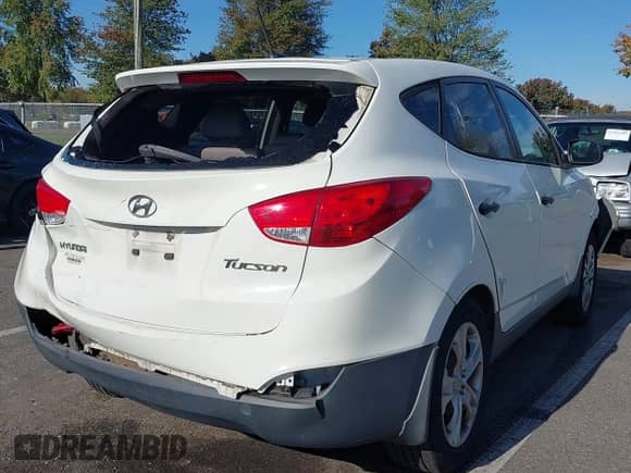 2012 Hyundai Tucson GL z VIN KM8JT3AB9CU447741, wystawiony jako IAAI lot #43370135 z przebiegiem 115 880 mil mil oraz . Historia ofert i sprzedaży dostępna na DreamBid. Obrazek 4.