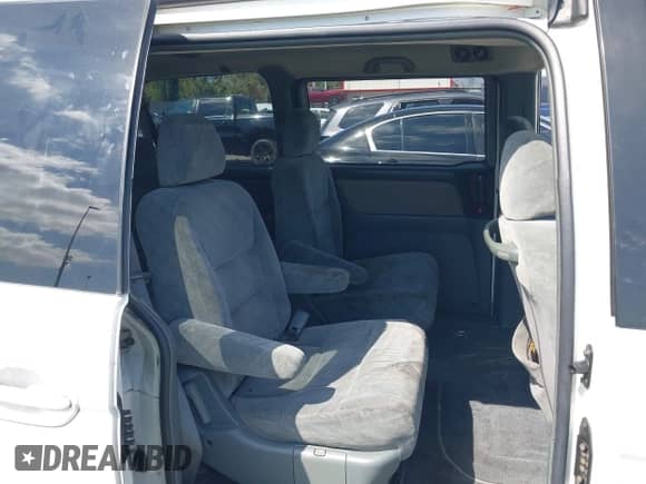 2002 Honda Odyssey EX with VIN 5FNRL18622B003502, listed as a IAAI auction lot 43216604 with 435,022 mi miles and . Bid and sale history available at DreamBid. Image 8.