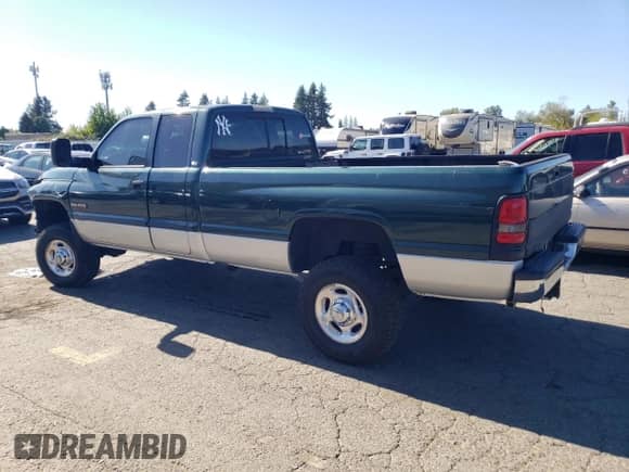 2001 Dodge 2500 with VIN 3B7KF23691G218700, listed as a Copart auction lot 80681015 with 161,010 mi miles and Salvage title. Bid and sale history available at DreamBid. Image 2.