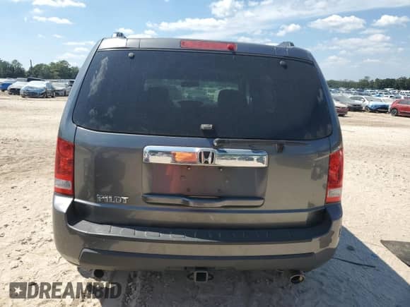 2011 Honda Pilot EX-L z VIN 5FNYF3H6XBB031109, wystawiony jako Copart lot #80355675 z przebiegiem 195 577 mil mil oraz Czysty tytuł • Clean title. Historia ofert i sprzedaży dostępna na DreamBid. Obrazek 6.