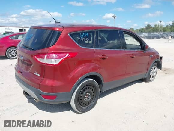 2014 Ford Escape SE with VIN 1FMCU0GX5EUC16474, listed as a IAAI auction lot 40276119 with 112,714 mi miles and . Bid and sale history available at DreamBid. Image 4.