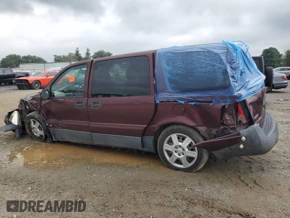 2007 Saturn Relay 2 with VIN 5GZDV031X7D131588, listed as a Copart auction lot 72697244 with Not provided miles and Salvage title. Bid and sale history available at DreamBid. Image 2.