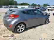 2012 Hyundai Veloster w/Black Int z VIN KMHTC6AD7CU028864, wystawiony jako Copart lot #66377895 z przebiegiem 130 440 mil mil oraz Szkoda całkowita • Salvage title. Historia ofert i sprzedaży dostępna na DreamBid. Obrazek 3.
