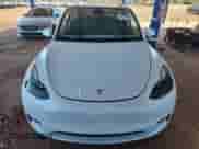 2024 Tesla Model Y с VIN 7SAYGDED6RF151122, выставлен на аукционе Copart как лот 81297445 с пробегом 11 716 миль миль и Списание • Salvage title. История ставок и продаж доступна на DreamBid. Изображение 5.