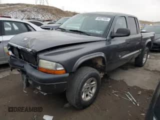 2003 Dodge Dakota Sport with VIN 1D7HG38N33S106425, listed as a Copart auction lot 89371695 with 159,449 mi miles and Salvage title. Bid and sale history available at DreamBid. Image 1.