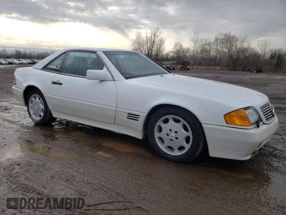 1992 Mercedes-Benz SL с VIN WDBFA66E7NF037949, выставлен на аукционе Copart как лот 44134135 с пробегом 130 910 миль миль и Чистый • Clean title. История ставок и продаж доступна на DreamBid. Изображение 4.