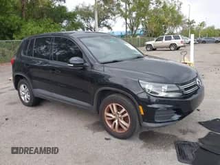 2013 Volkswagen Tiguan SE with VIN WVGAV3AX4DW607441, listed as a IAAI auction lot 42173141 with 113,186 mi miles and . Bid and sale history available at DreamBid. Image 1.