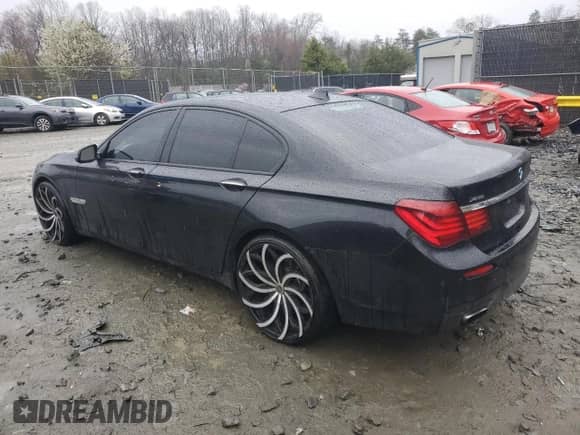 2013 BMW 7 Series 750i xDrive with VIN WBAYB6C58DD223681, listed as a Copart auction lot 50156875 with 139,422 mi miles and Salvage title. Bid and sale history available at DreamBid. Image 2.